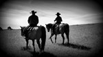 cowboys talking horseback
